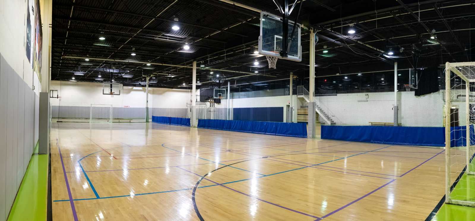 Empty indoor hardwood court 2 measuring 105 by 50 feet at La Liga Toronto