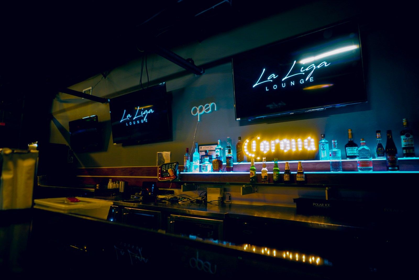 Neon lit bar at La Liga Lounge in North York Toronto at night