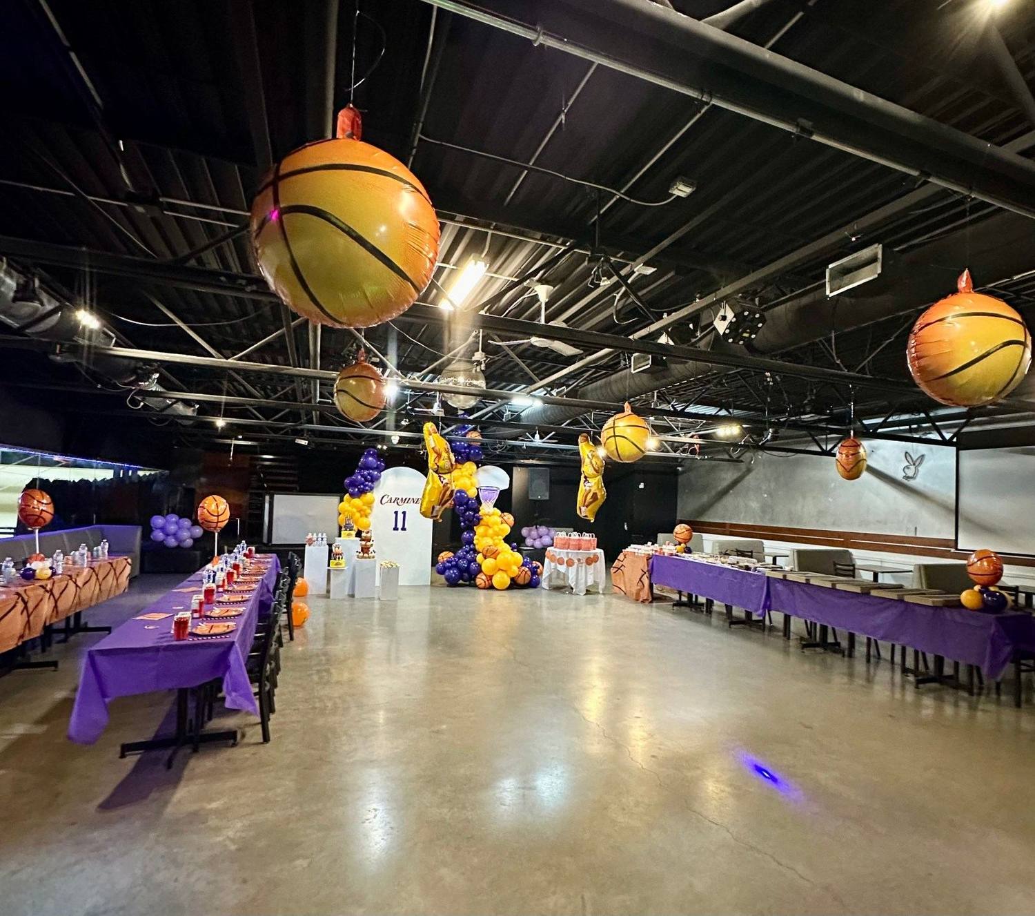 Sports themed birthday party setup with basketball balloons at La Liga Toronto